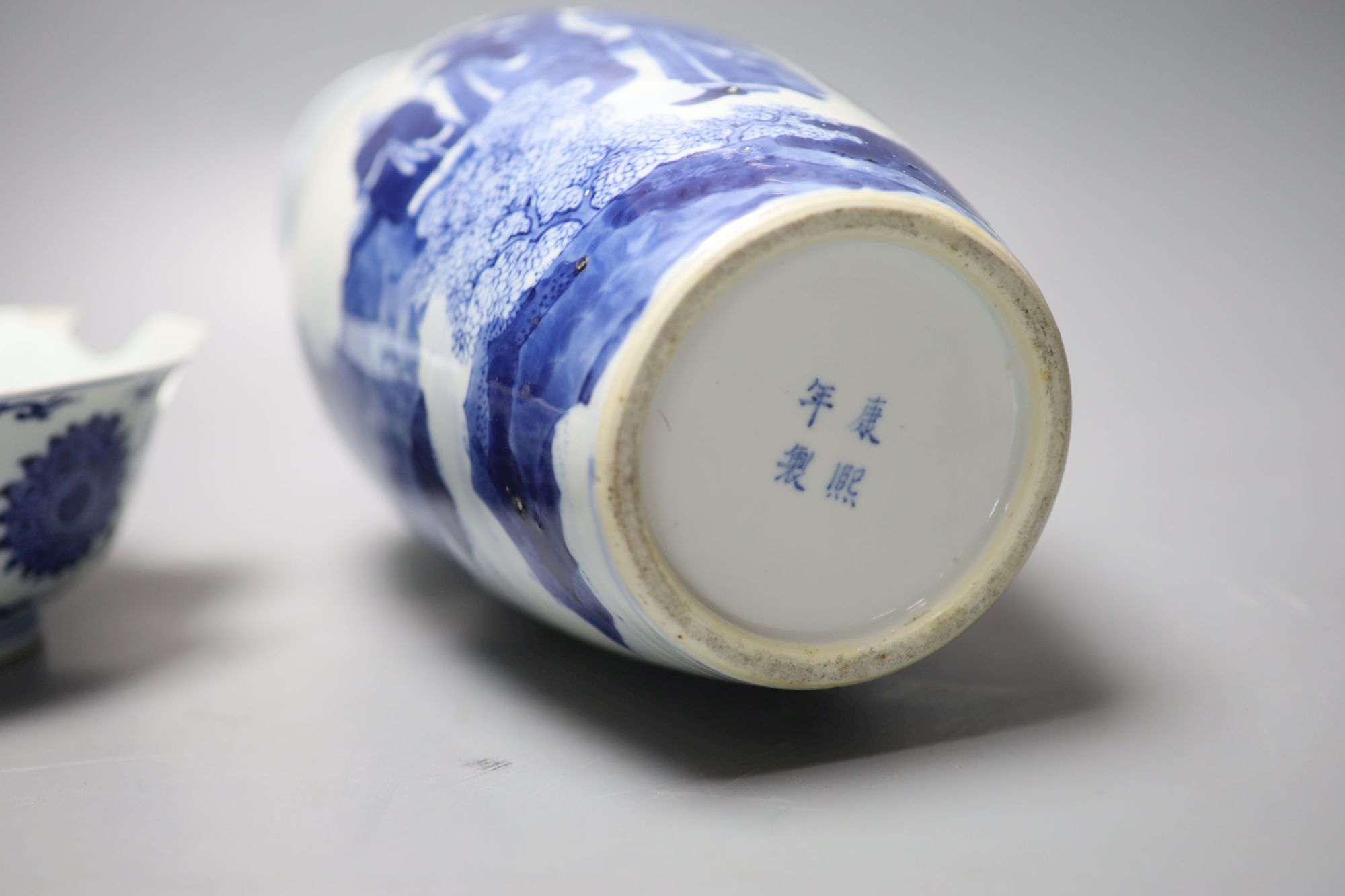 A Chinese blue and white vase, Kangxi mark, c.1900, 36cm and a similar bowl, Qianlong seal mark, early 20th century, 18.5cm